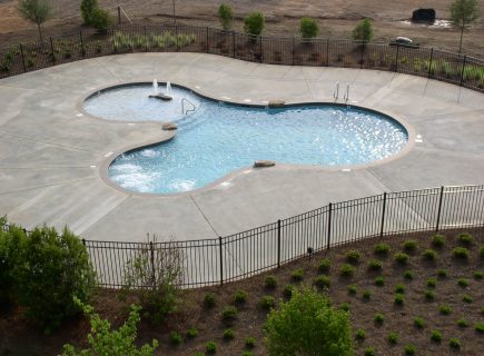 Commercial Freeform Swimming Pool with Fountain in Lincoln