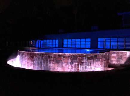 Freeform Infinity Pool at night