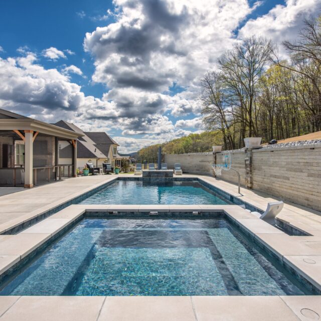 rectangle swimming pool with above ground spa