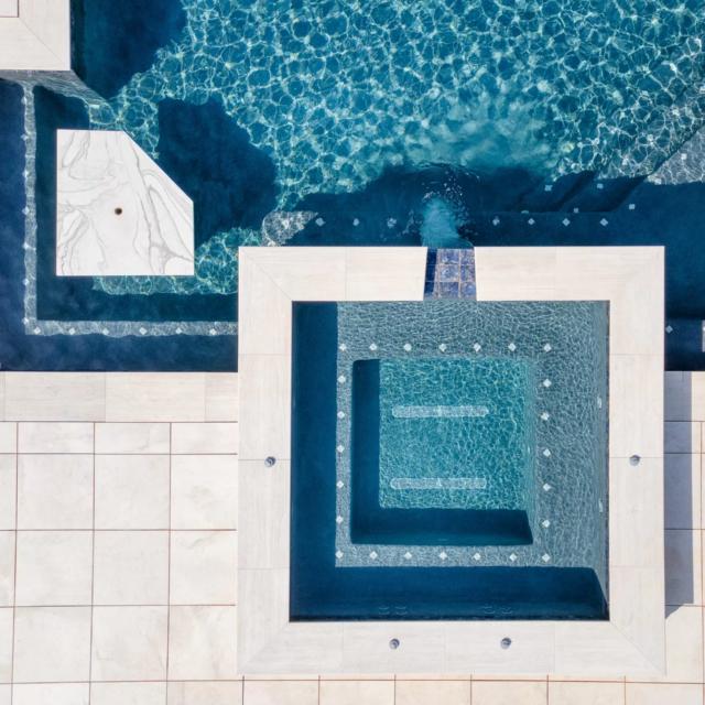 a geometric spa from above with inbuilt pool table
